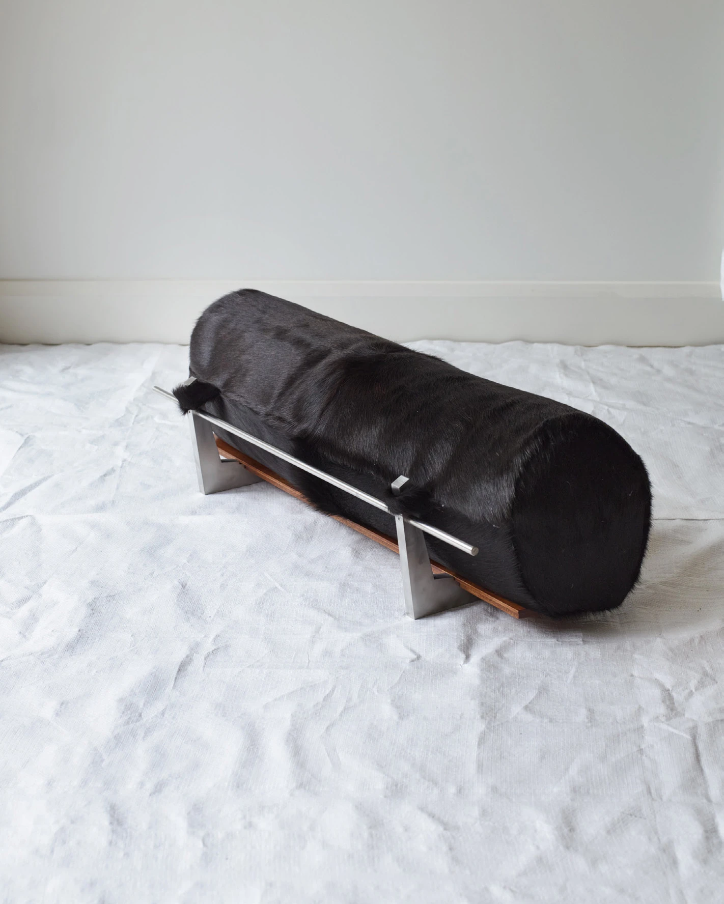 The Architectural Completion of a Floor Bolster Cushion – Brown