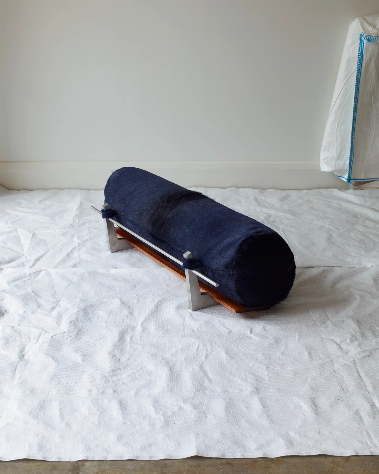 The Architectural Completion of a Floor Bolster Cushion – Blue