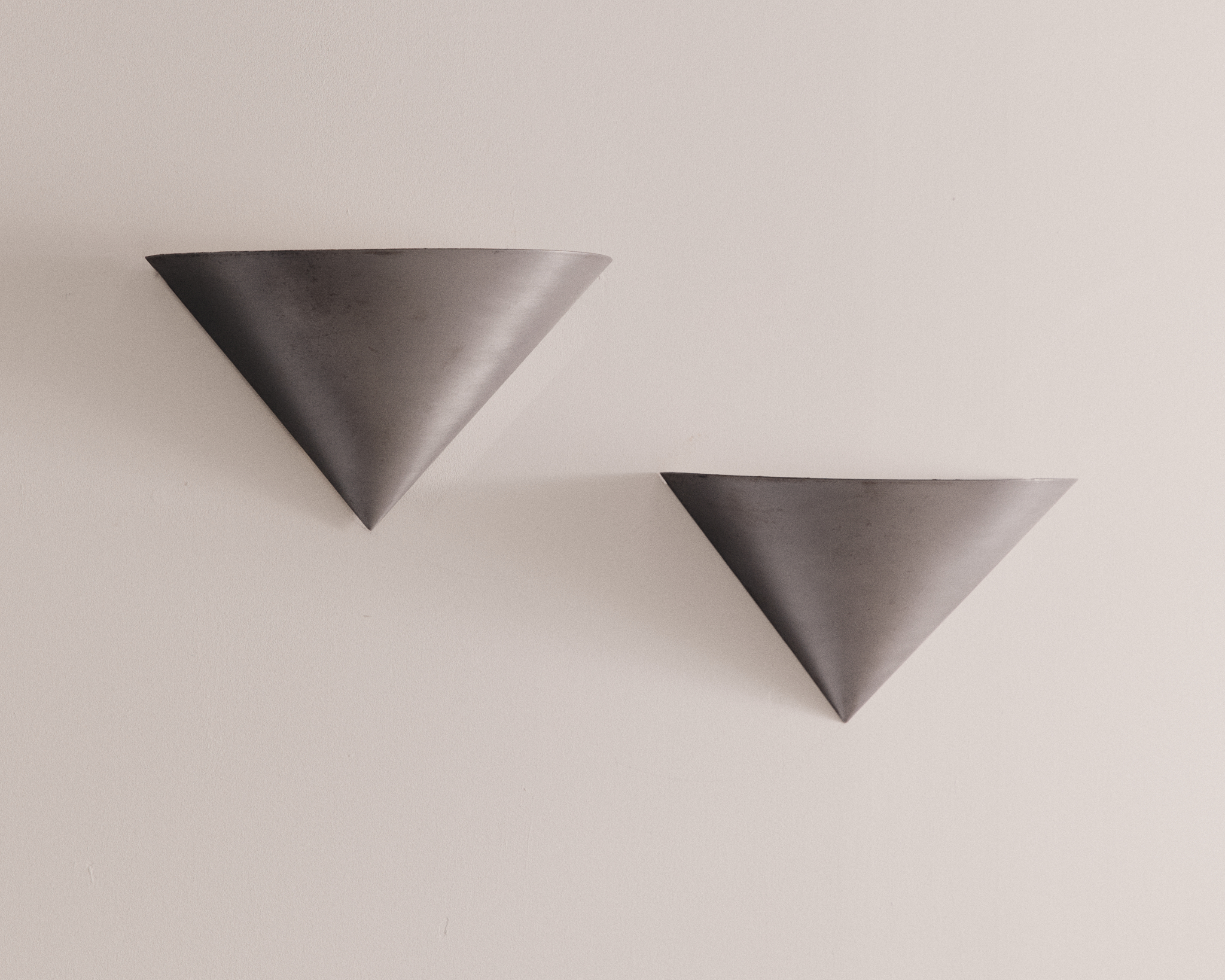 Pair of cone sconces in treated steel