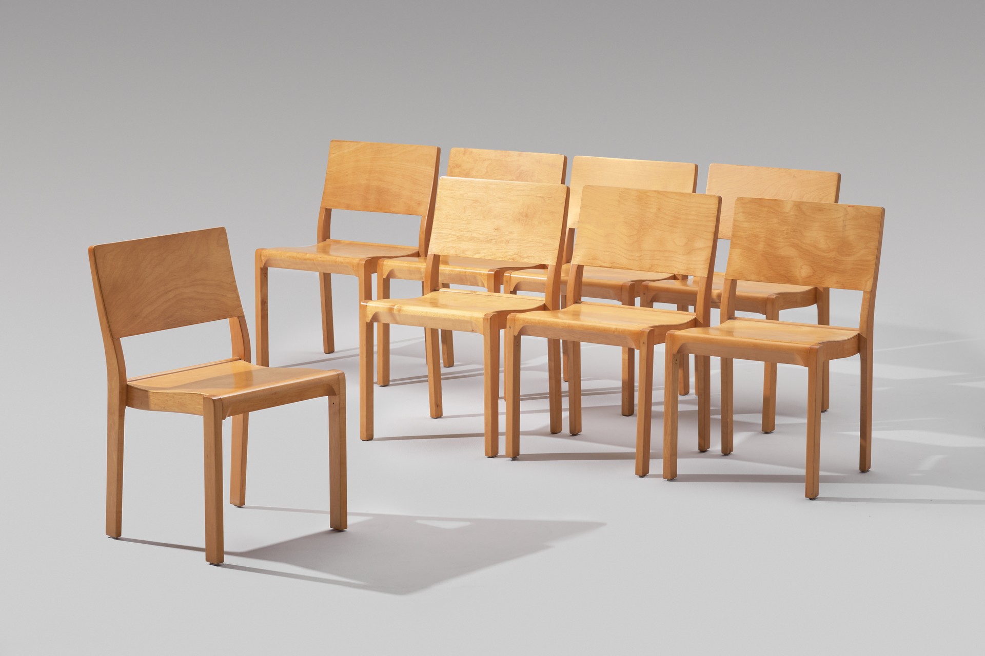 Set of Eight Stackable Dining Chairs