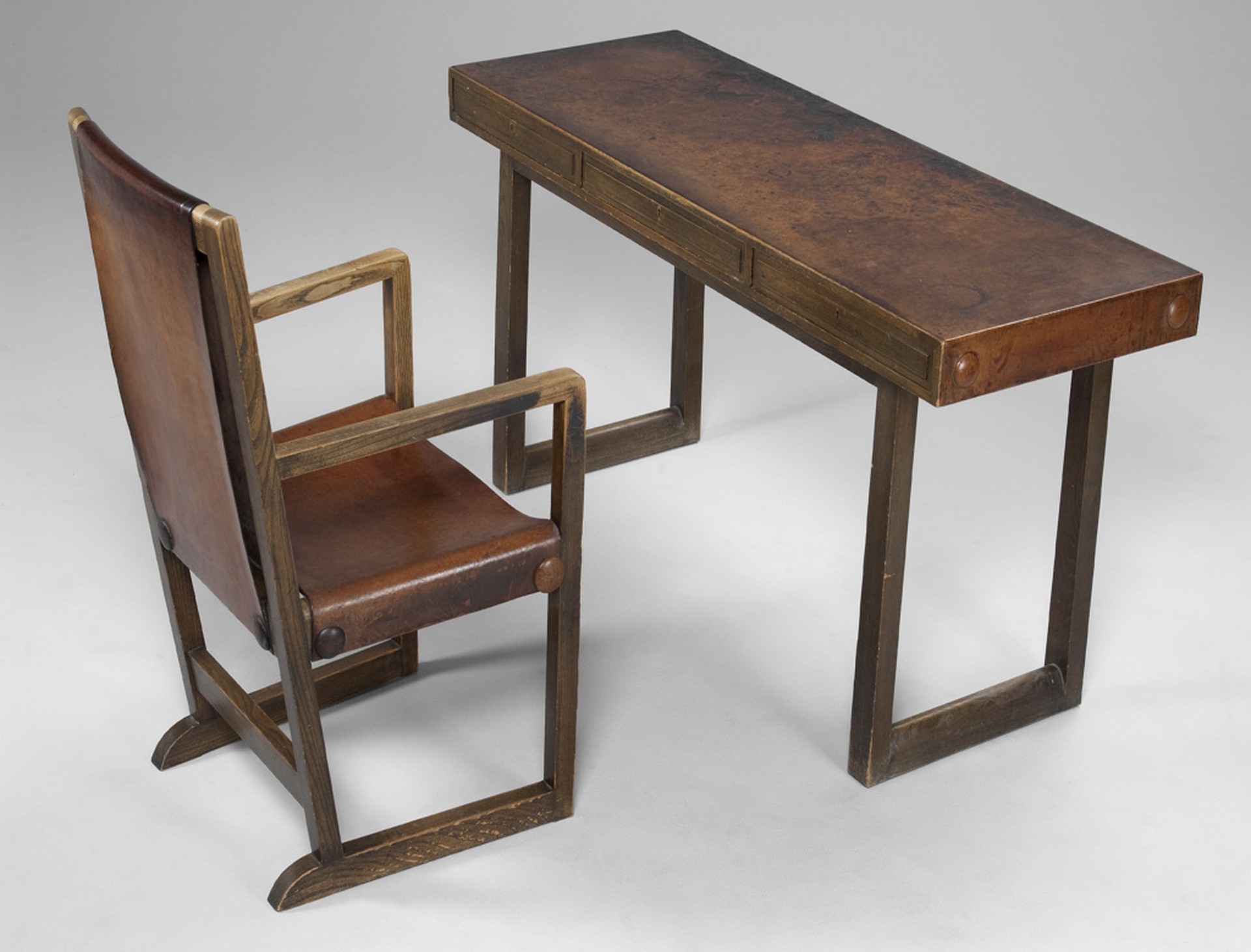 No.7452. Hjorth Desk & Chair. Oak and original leather and leather covered buttons. Exhibited at the Stockholm exhibition 1930. Metal Label R35325-C MÖB. Model "Funkis".