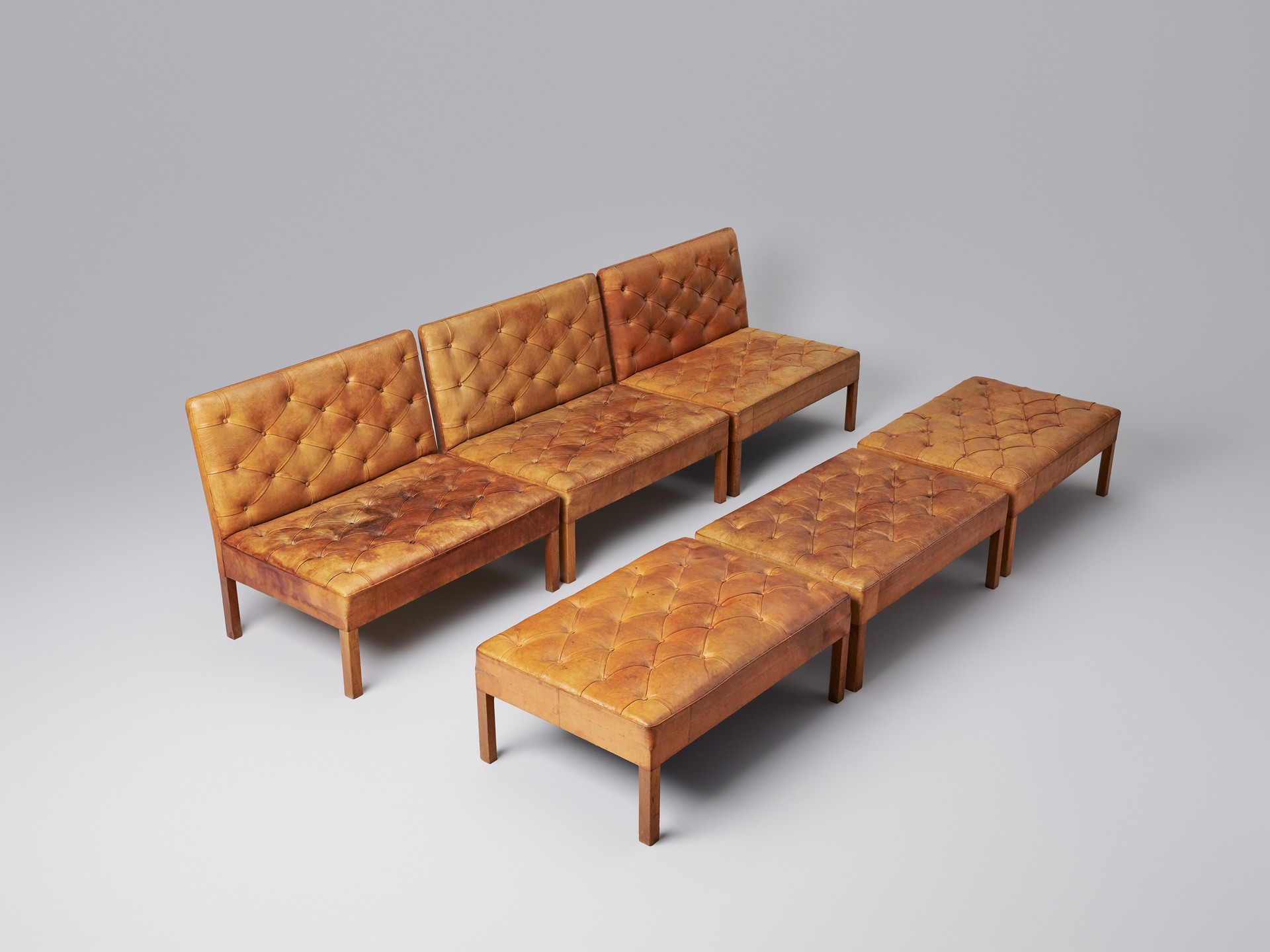 Set of three 'Addition' Sofas and Ottomans
