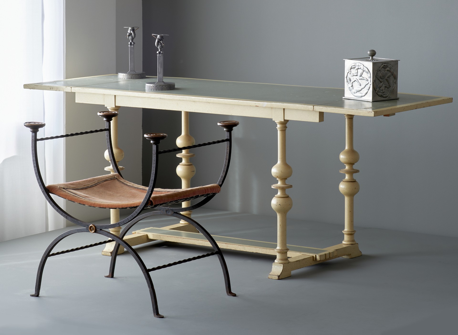 Neoclassical Stool, Carl Hörvik, 1920s, Forged iron, impressed decoration, brass, velvet.
'Blidö Table', Axel Einar Hjorth, Produced by Nordiska Kompaniet, 1928, Lacquered wood.
Set of Candlesticks, Anna Petrus, Produced by Herman Bergman, 1920s, Pewter, brass.