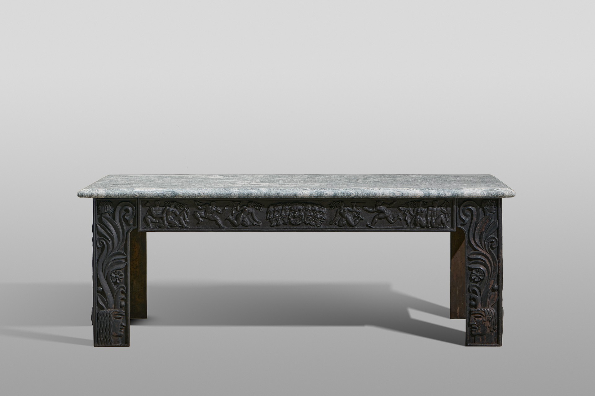 Anna Petrus, Table, 1927, Cast-iron, partly painted black, relief decoration throughout, granite top, Produced by Näfveqvarns Bruk.