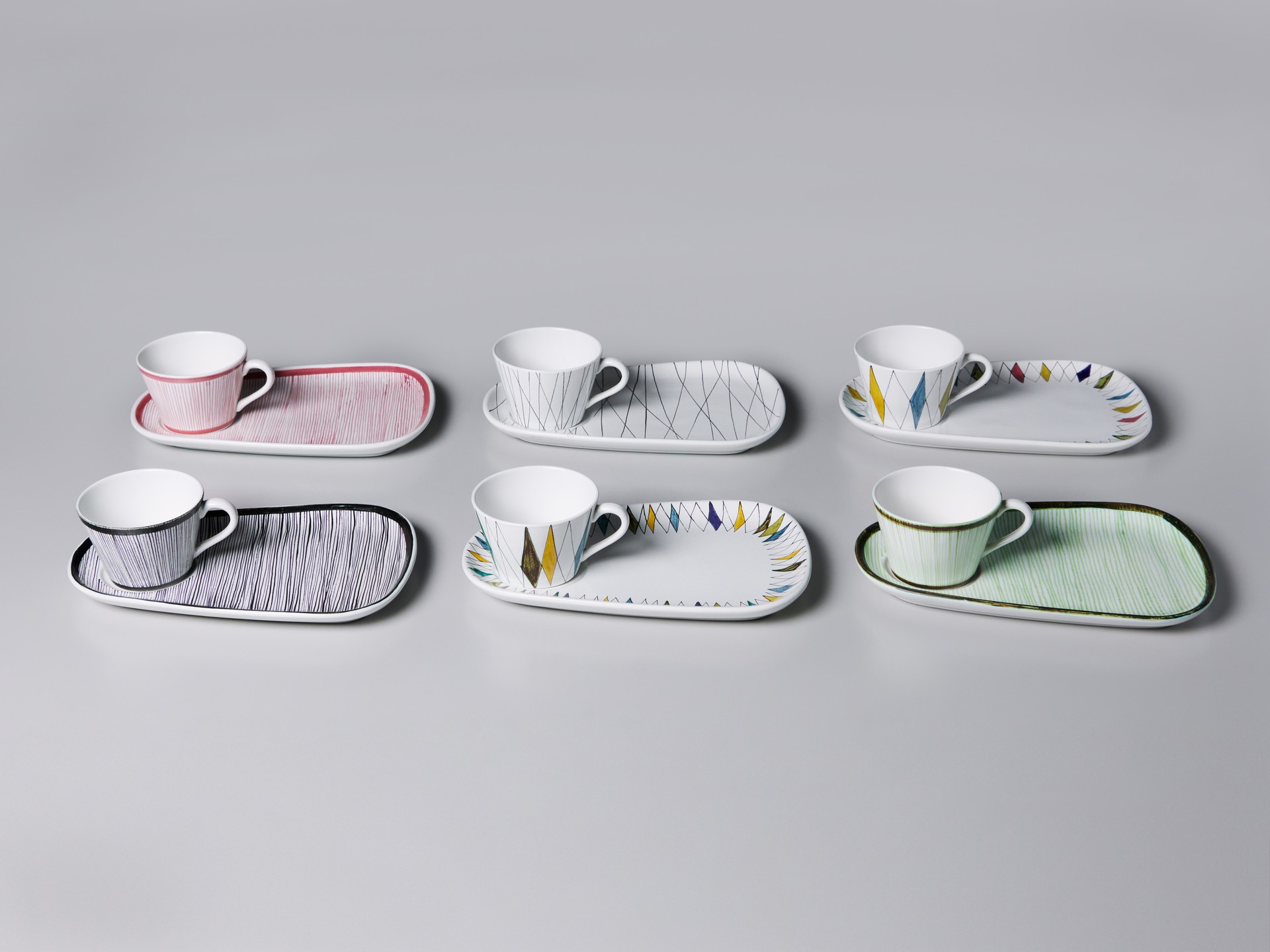 Six 'TV' Cups and Saucers