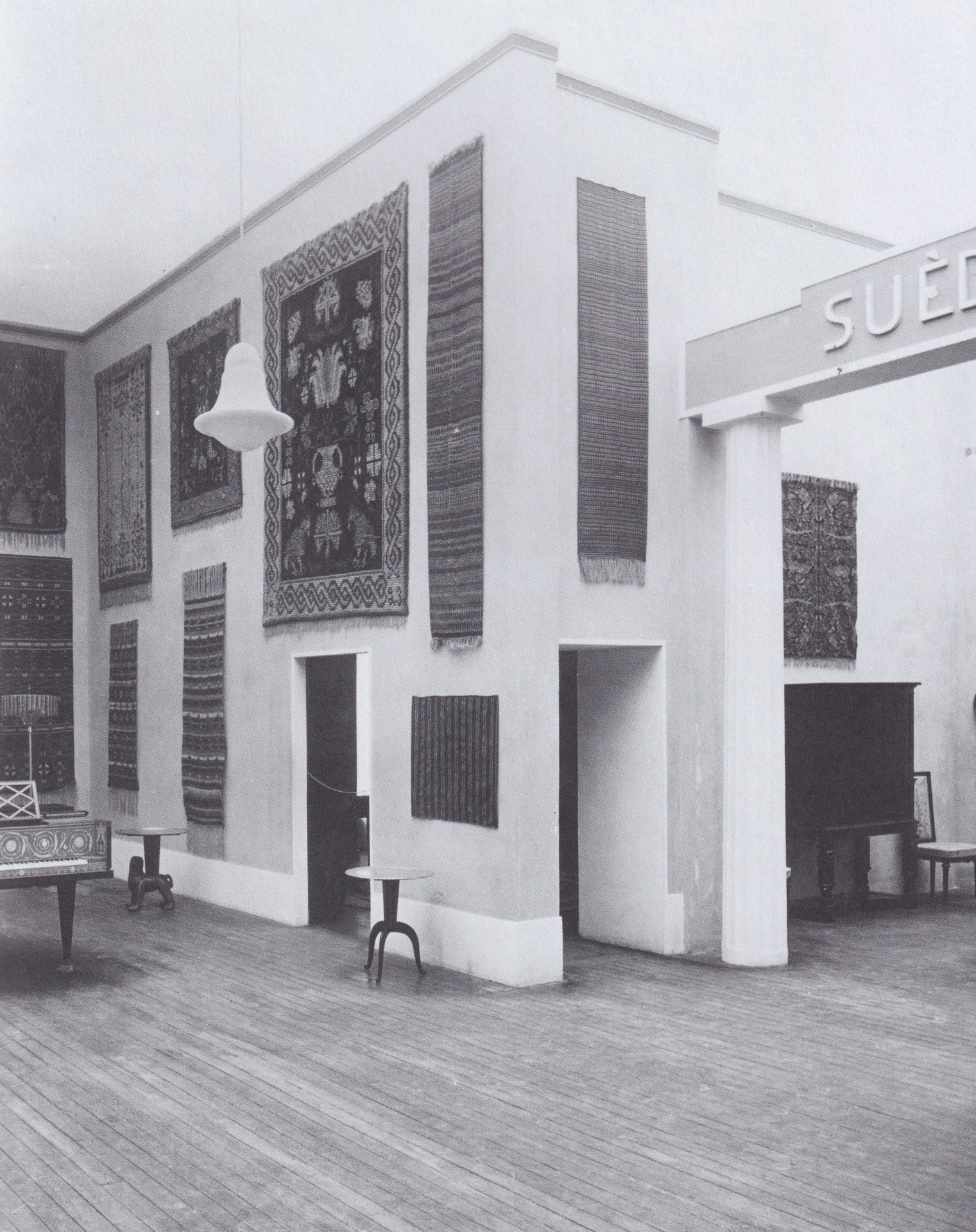 Swedish Pavilion in the International Exhibition of Applied Arts in Paris 1925, with in the distance the Anna Petrus lion-tray table