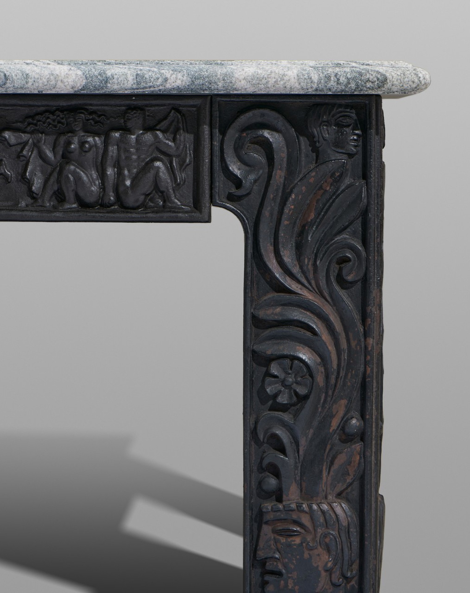 Anna Petrus, Table, 1927, Cast-iron, partly painted black, relief decoration throughout, granite top, Produced by Näfveqvarns Bruk.