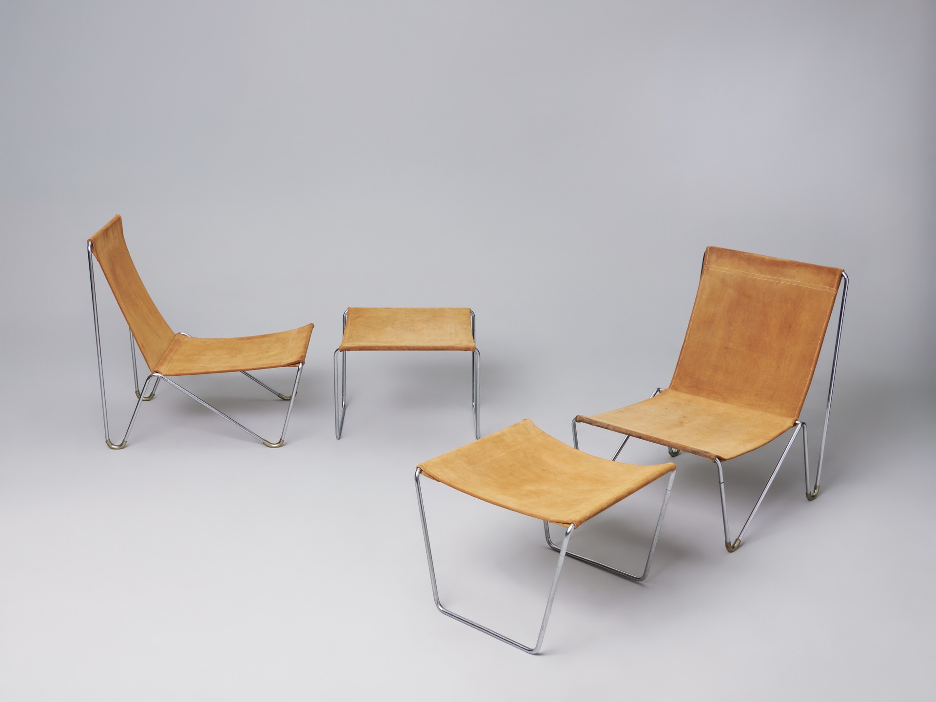 Pair of Lounge Chairs and Ottoman