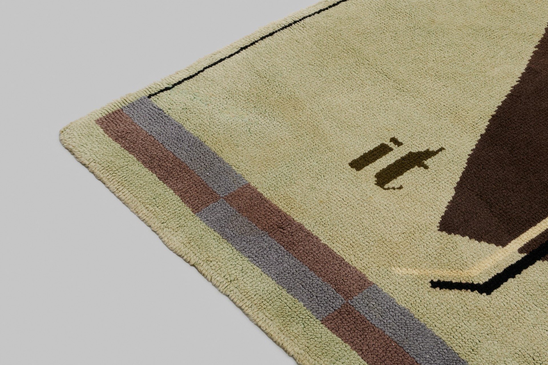 Important Rug, Designed in 1929, executed in 1930, Hand-knotted wool, with woven 'it'.
