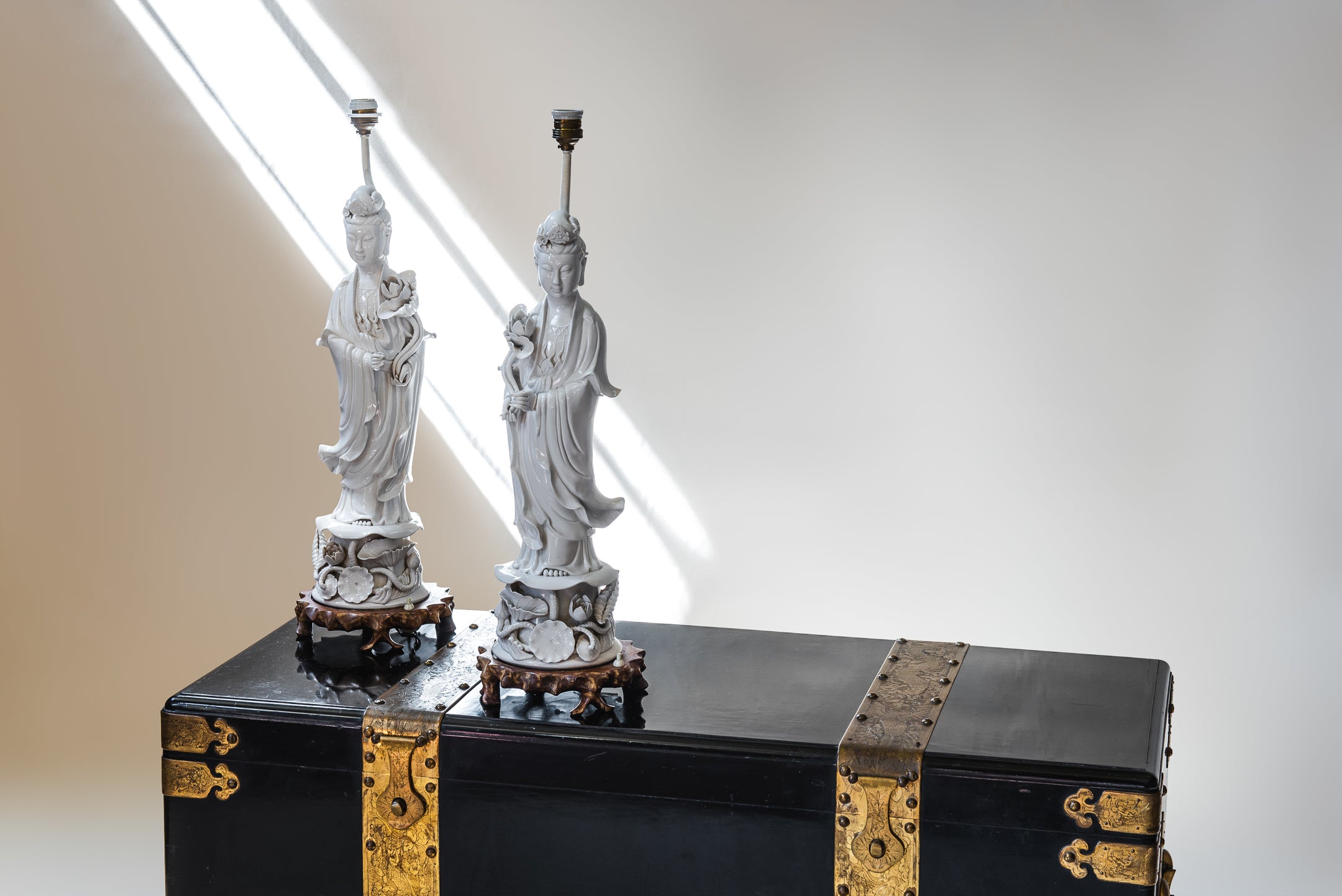 A large Pair of Blanc-de-Chine Guanyin Figures