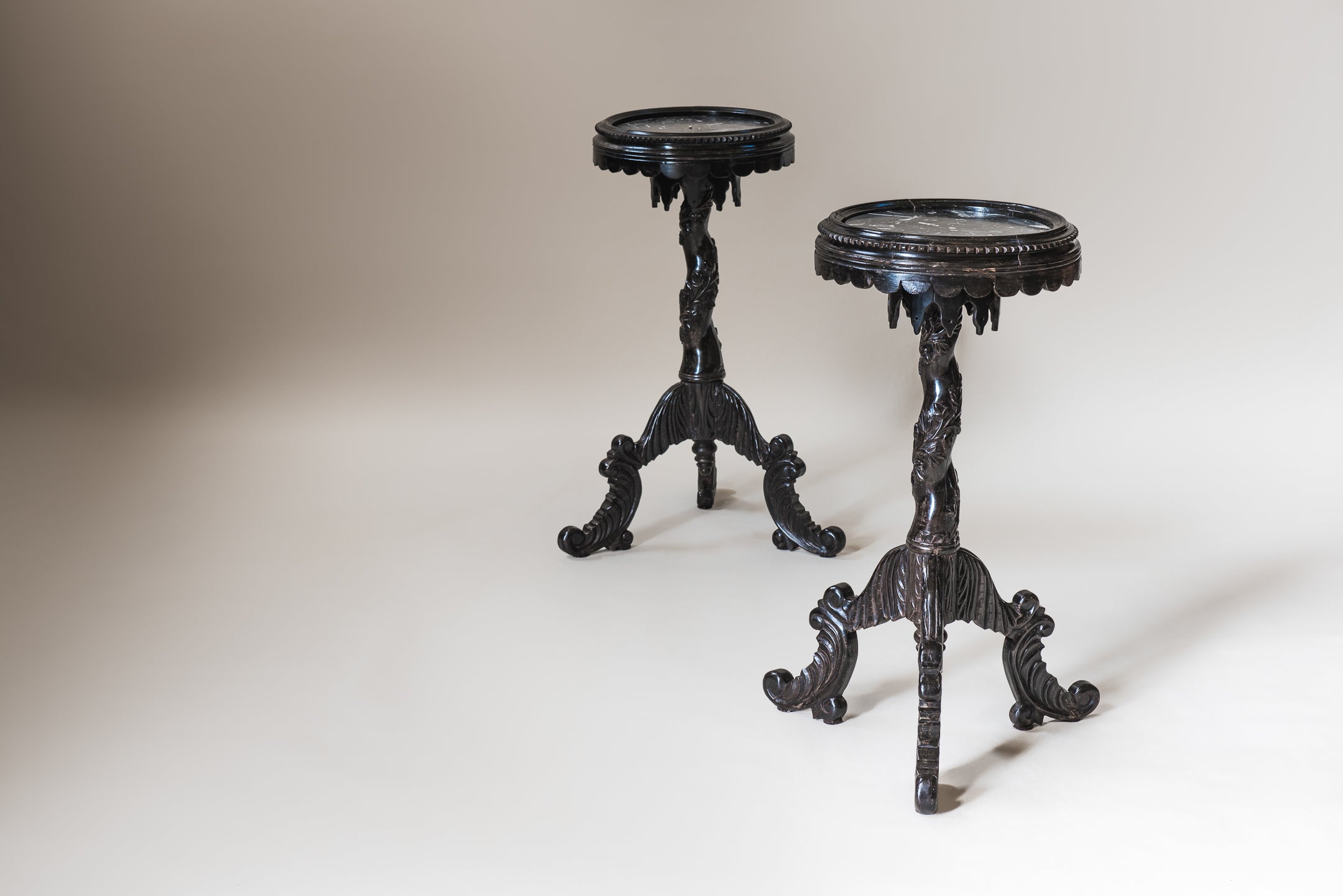 A Pair of Ebony Tripod Stands