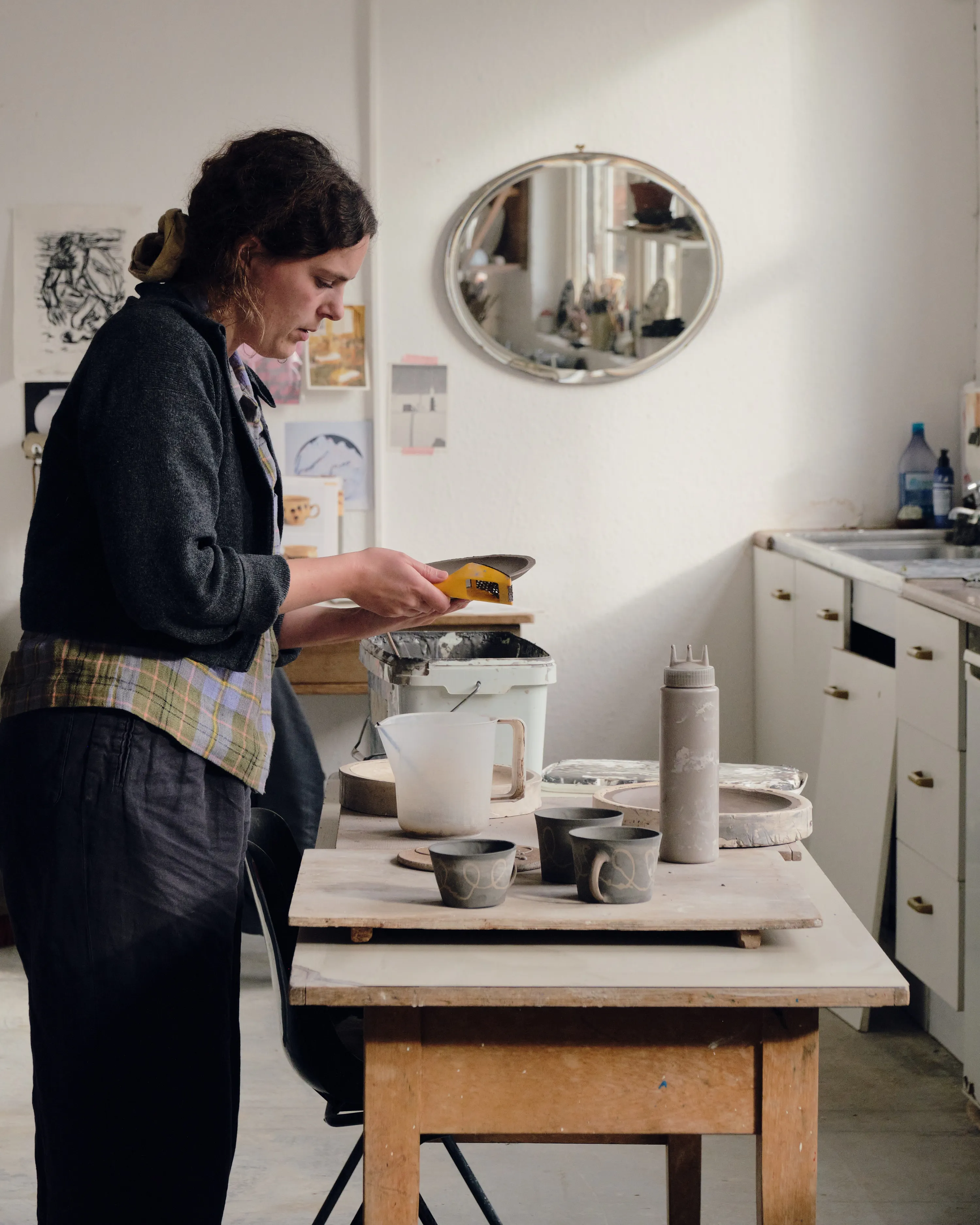 Ali uses her secret yellow grater that's perfect for tidying edges