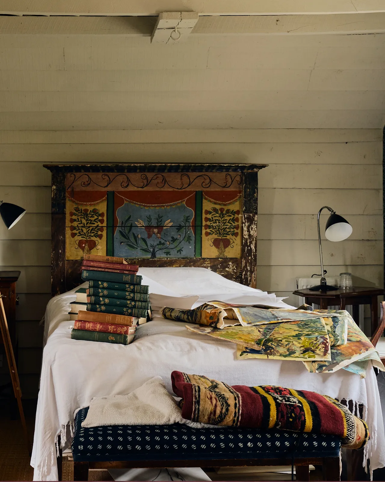 Past works pile up in the guest bedroom at her Wiltshire home.